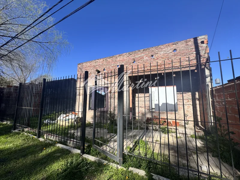 Lote en venta con superficie construida – Barrio La Palomita